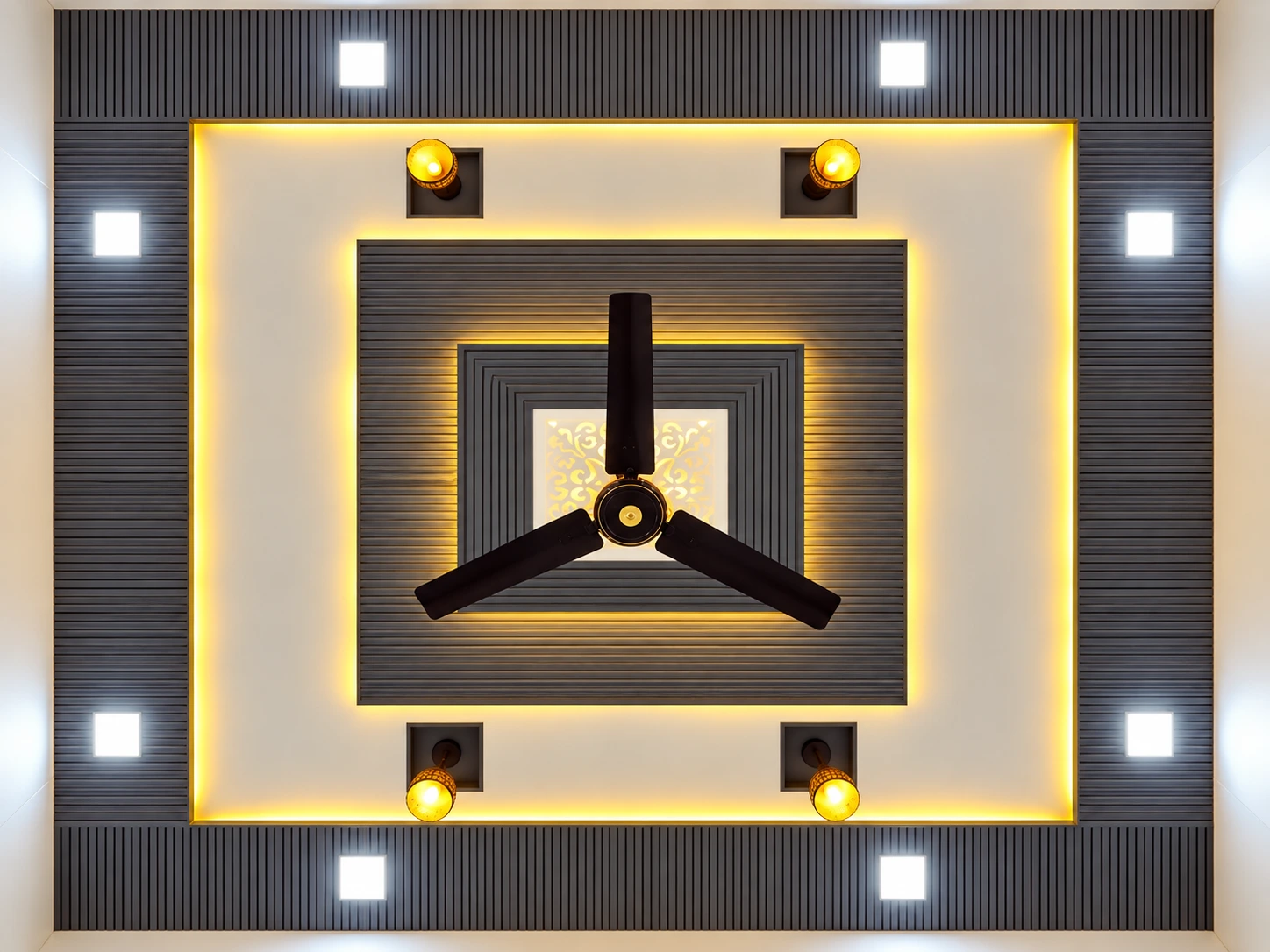 Black and gold framed PVC down ceiling with a central fan