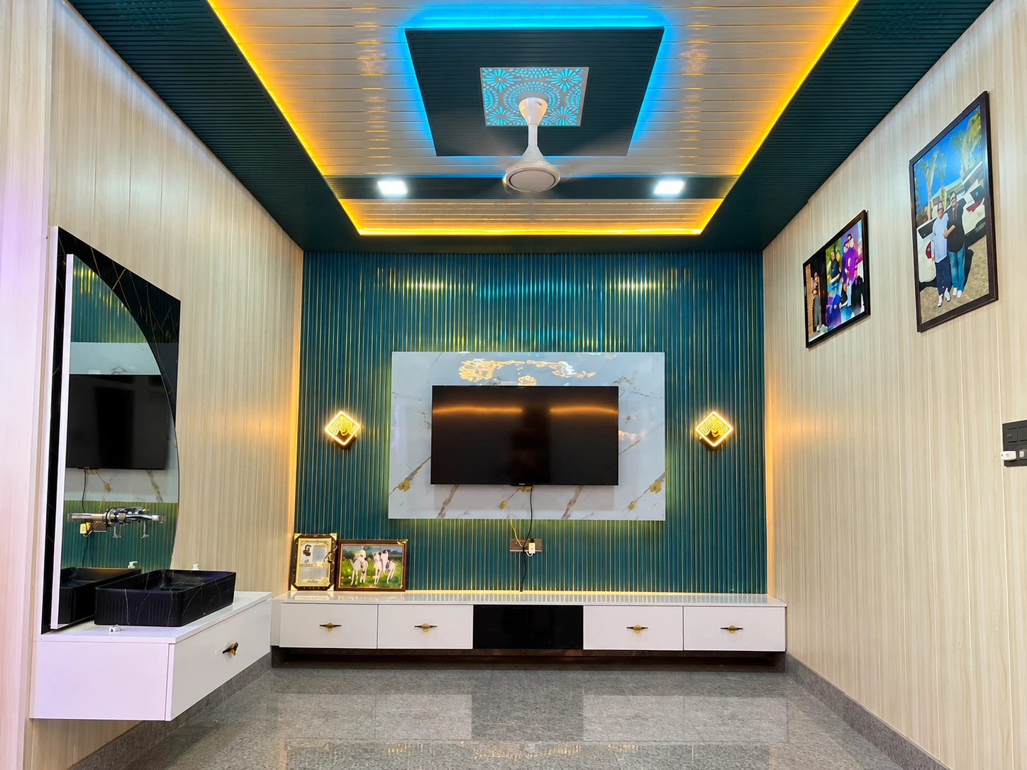 TV wall with fluted panels, marble-effect surround, and ceiling design