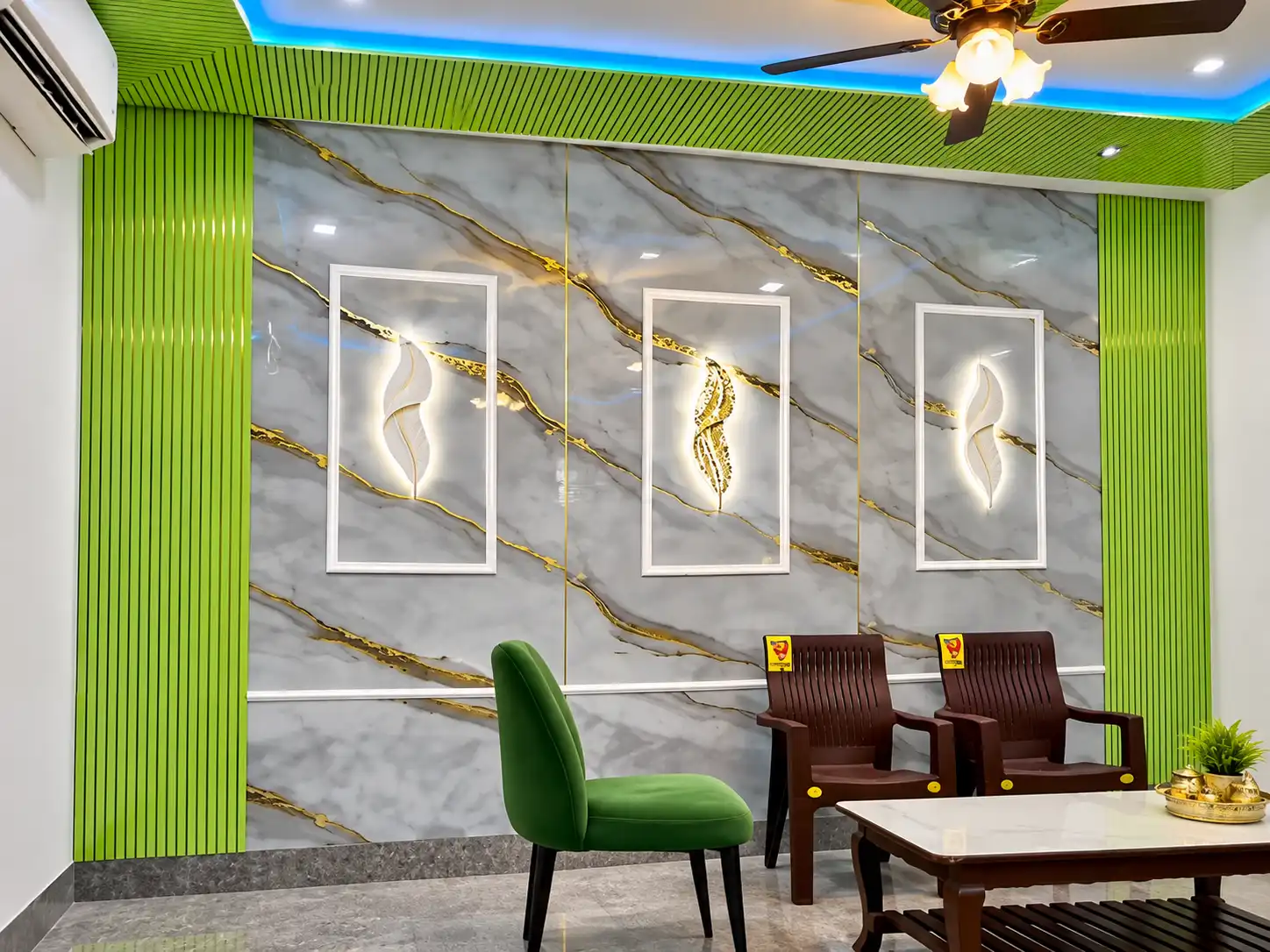 Grey and white marble-effect wall panels with green fluted side columns