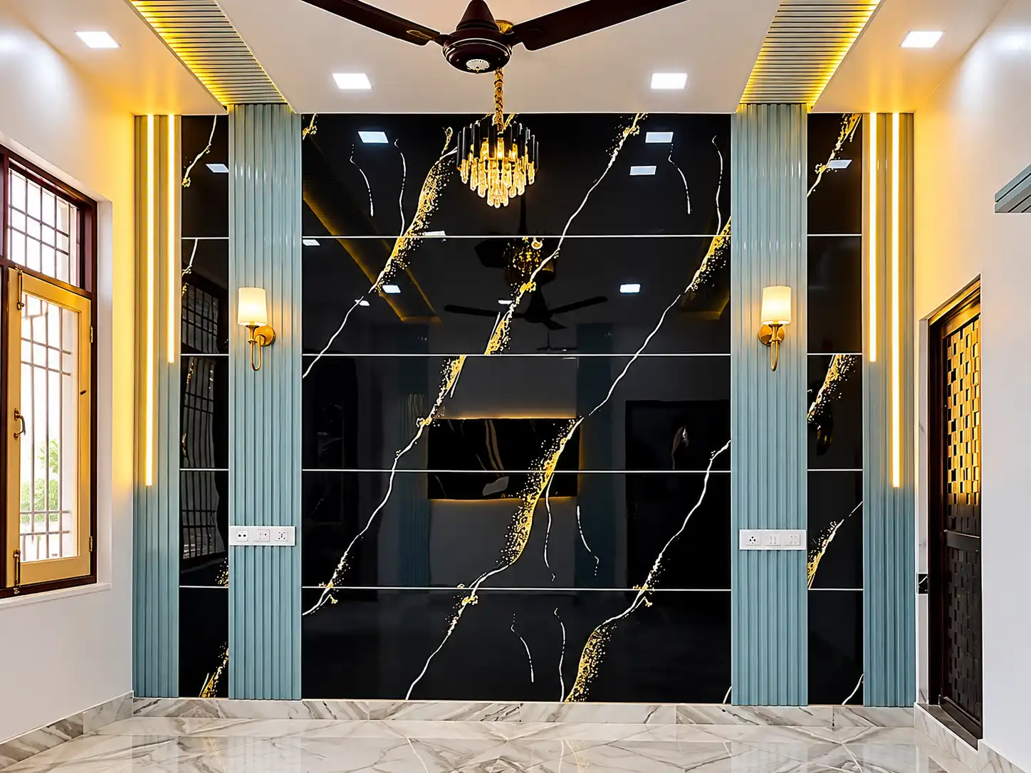 Black marble-effect wall panels with gold veining and blue fluted side columns